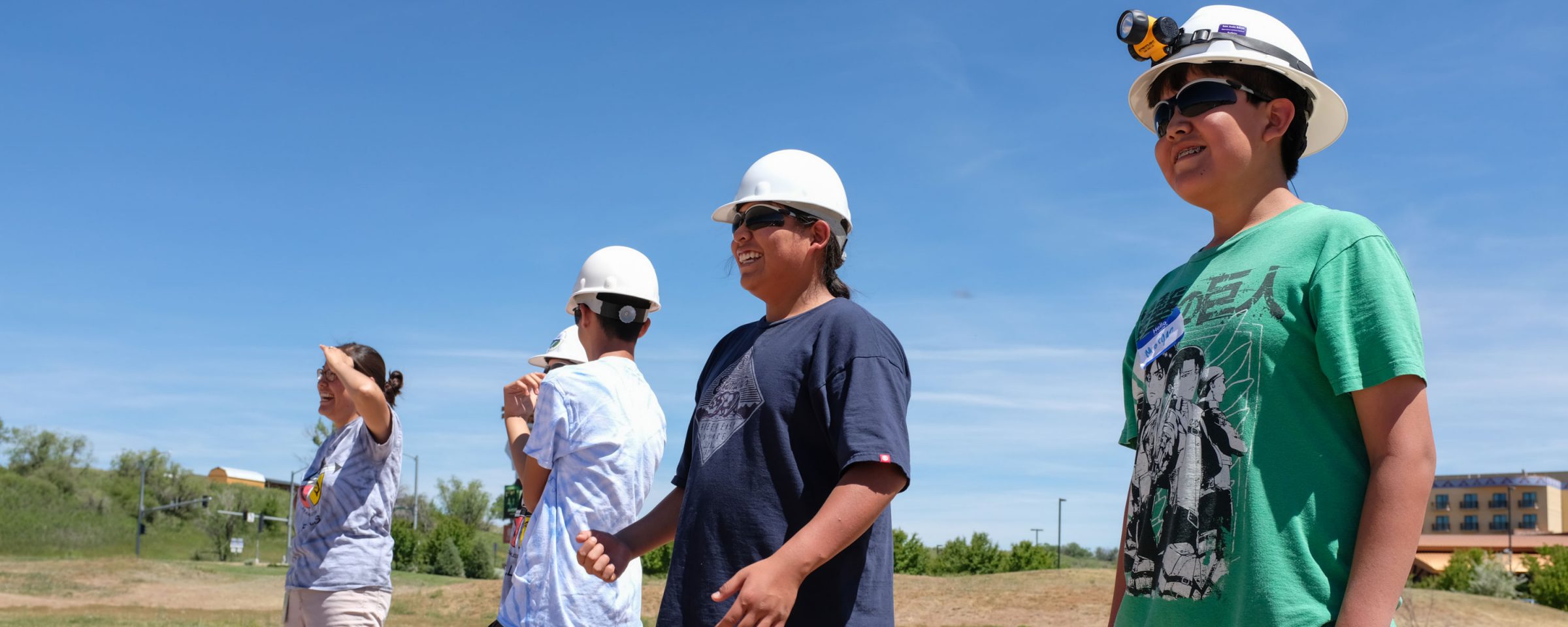 image of kids standing in parking lot