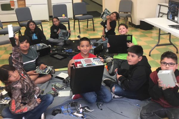 image of kids with computer parts