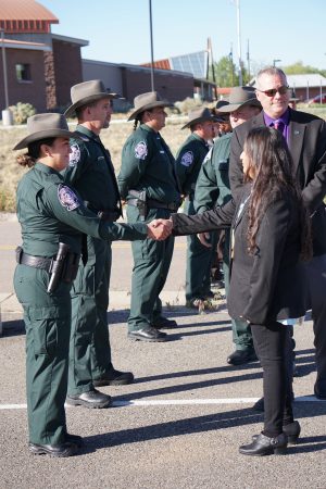 image of rangers shaking hands with councilman